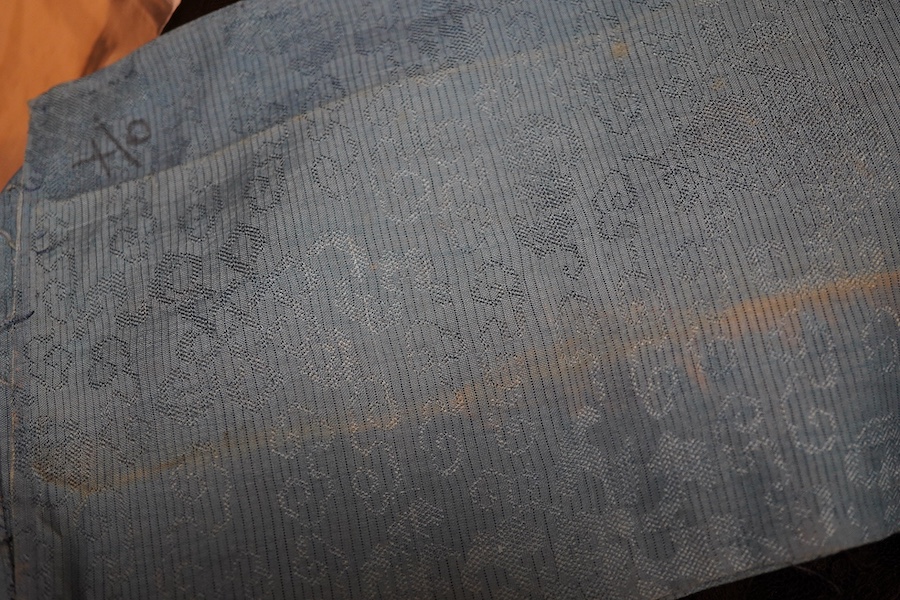 A pair of Chinese silk embroidered sleeve bands and a small collection of black lace stoles, etc.